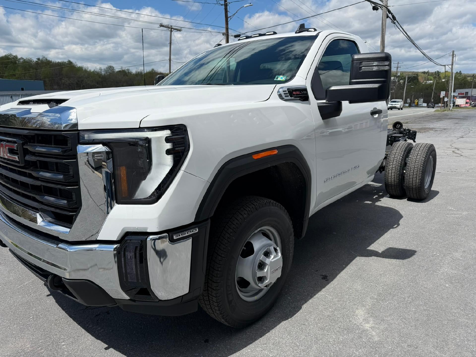 2026 GMC Sierra 3500 HD Chassis Cab Pro in Summit White — front three-quarter view