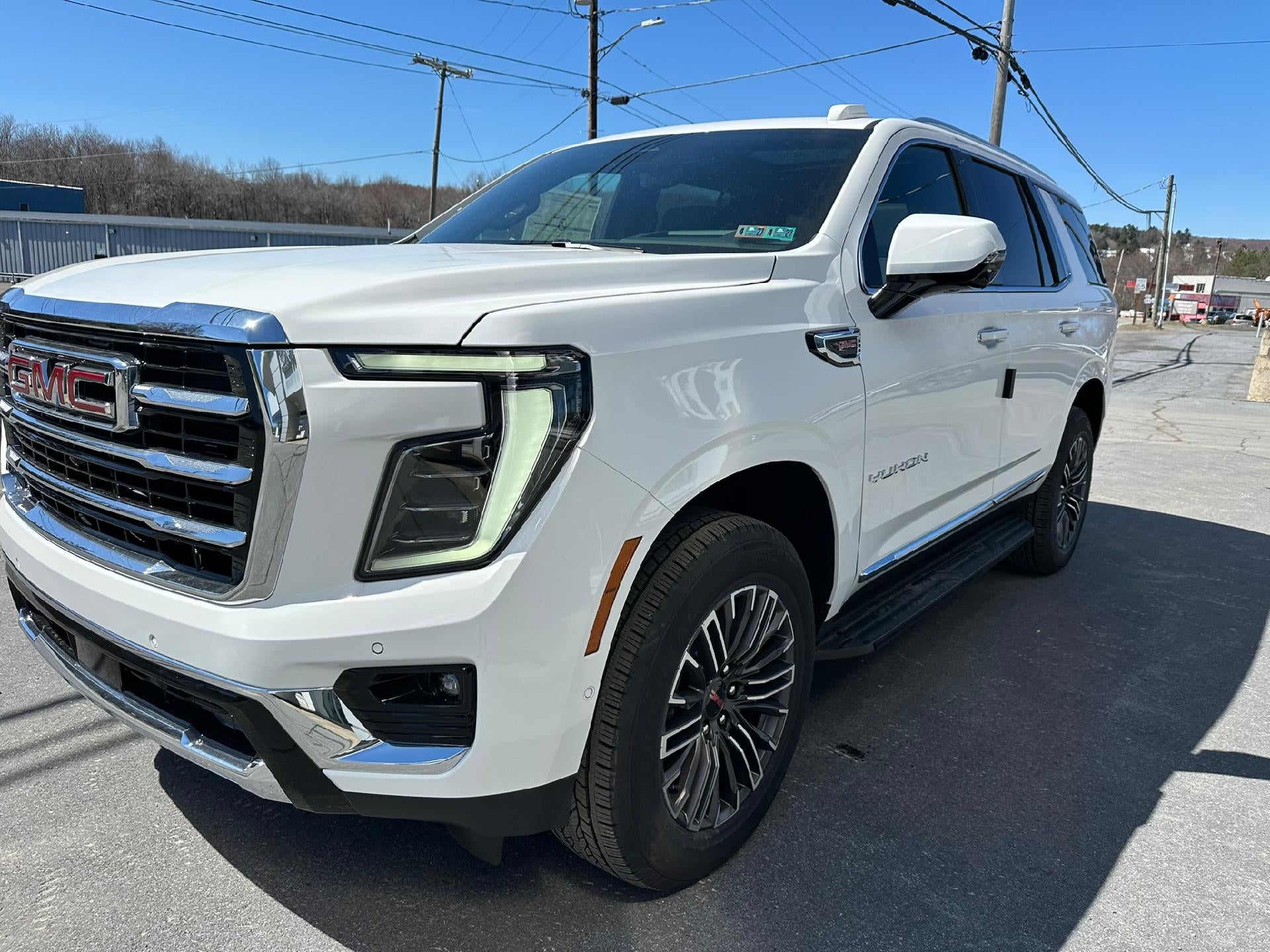 2026 GMC Yukon Elevation in Summit White — front three-quarter view