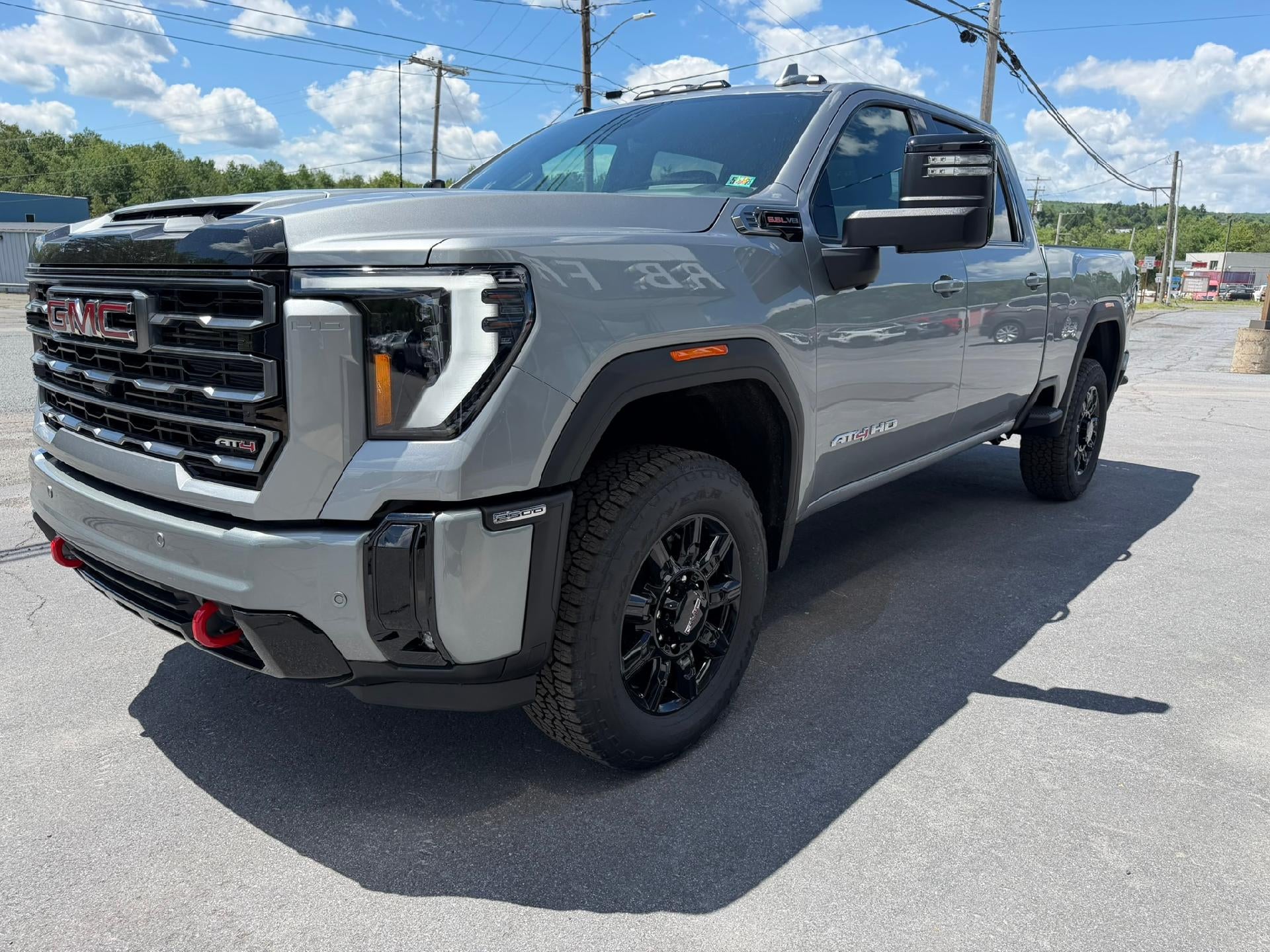 2026 GMC Sierra 2500 HD AT4 in Sterling Metallic — front three-quarter view