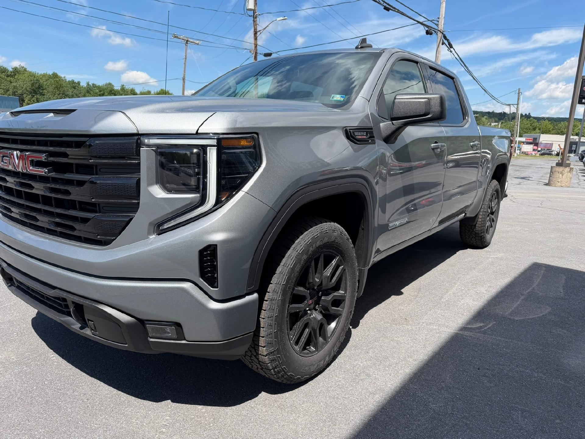 2026 GMC Sierra 1500 Elevation in Sterling Metallic — front three-quarter view