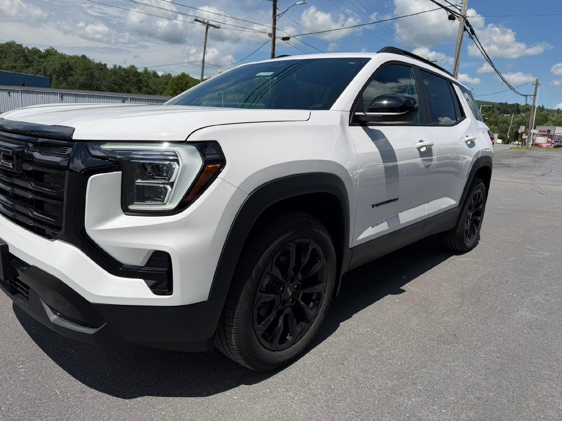 2026 GMC Terrain Elevation in Summit White — front three-quarter view