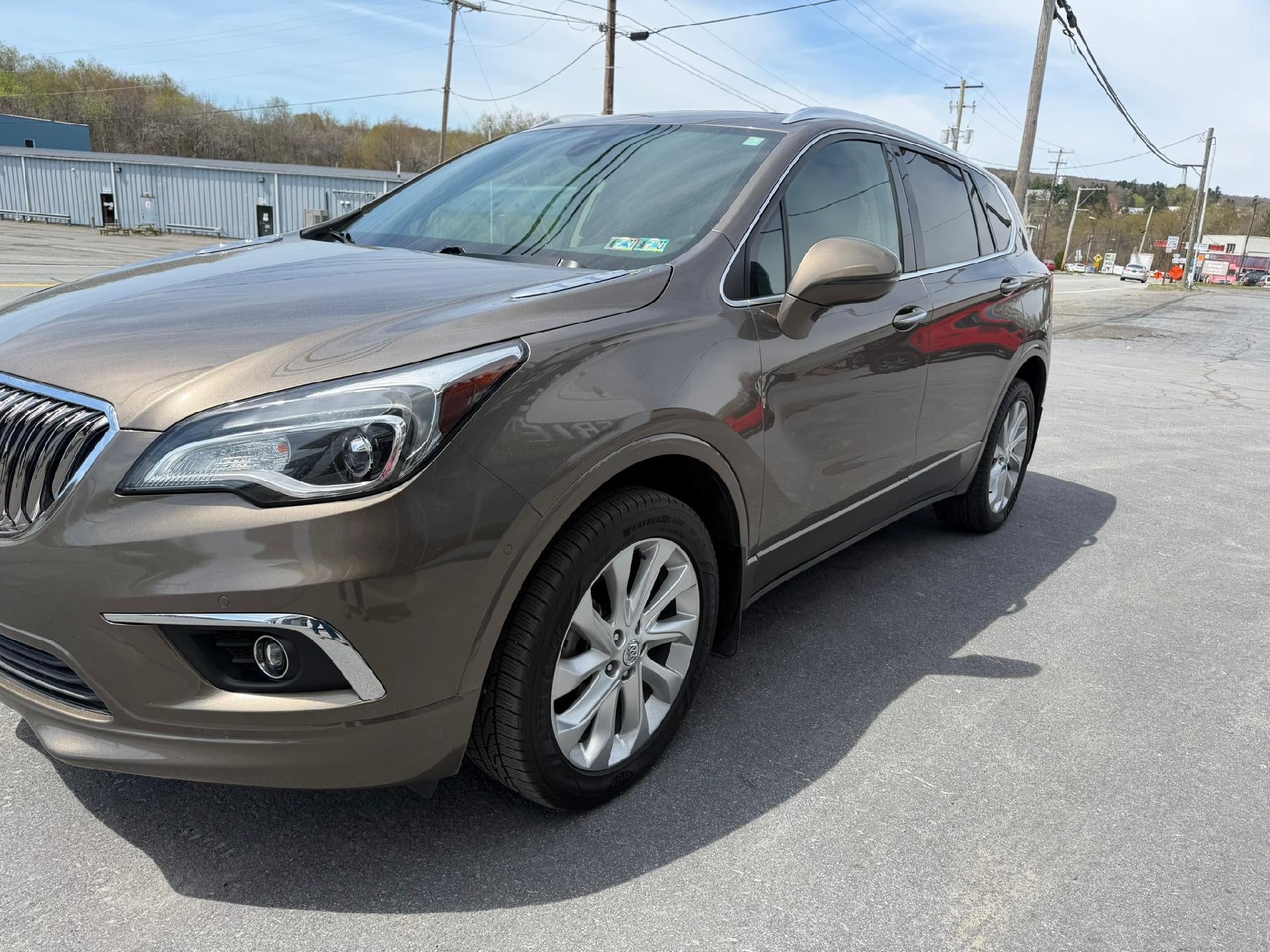 2017 Buick Envision Premium II in Bronze Alloy Metallic — front three-quarter view
